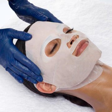 Close-up of Bio-Therapeutic Infusion Collagen Masque showing rich, creamy texture for skin rejuvenation
