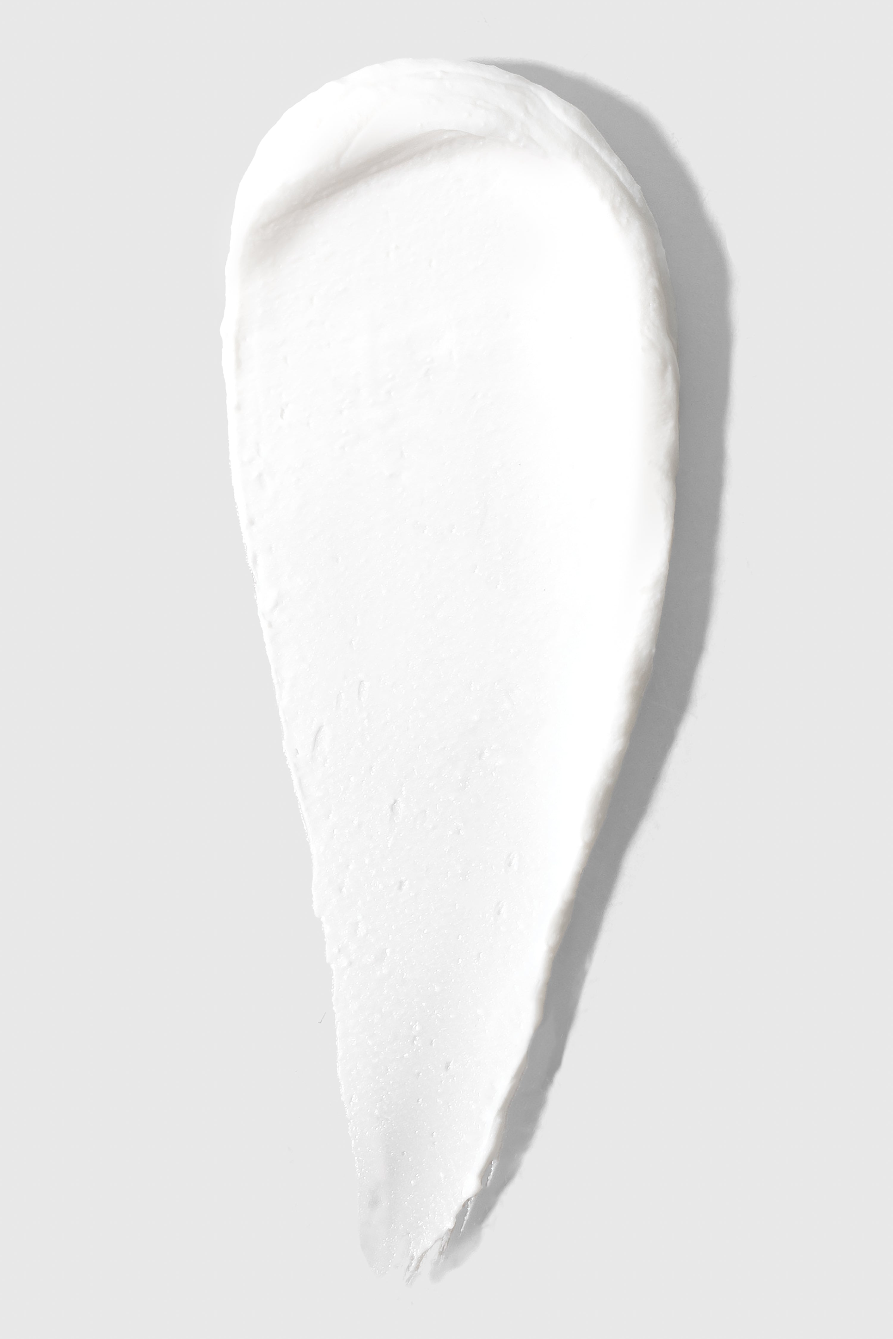 Close-up of TiZO Mineral Stick Non-Tinted SPF 45 showing smooth, non-tinted mineral formula
