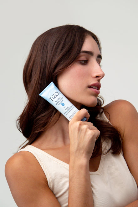 Close-up of TiZO2 Facial Primer Non-Tinted showing smooth, blendable non-tinted primer texture
