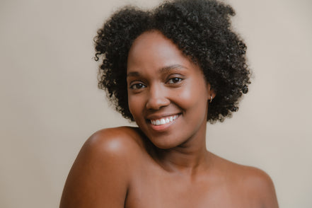 Close-up of TiZO Tinted Moisturizing Serum SPF 30 showing smooth, blendable tinted formula
