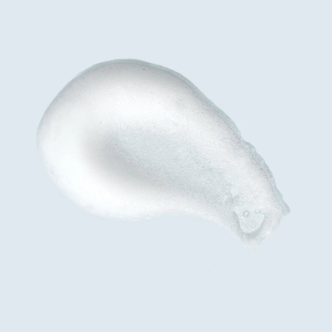 Close-up of TiZO Foaming Cleanser showing foaming texture for effective cleansing

